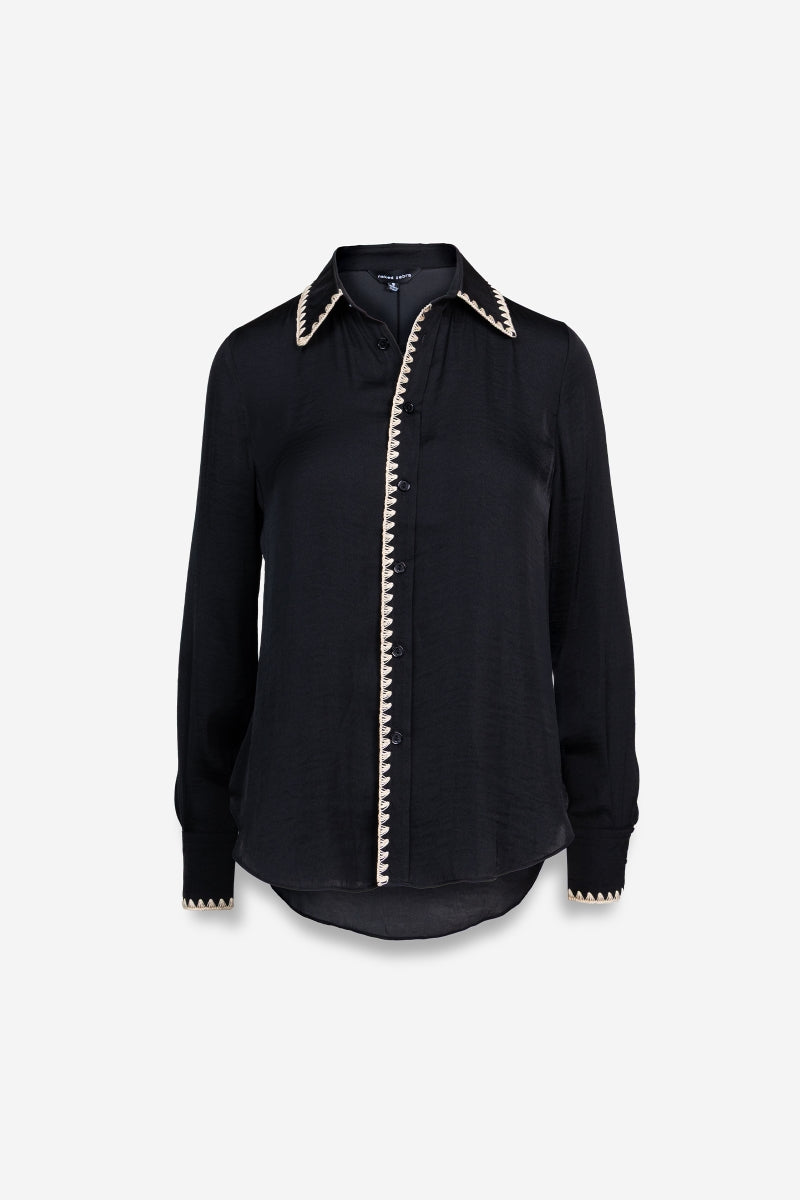 Black shirt with white trim on a light gray background